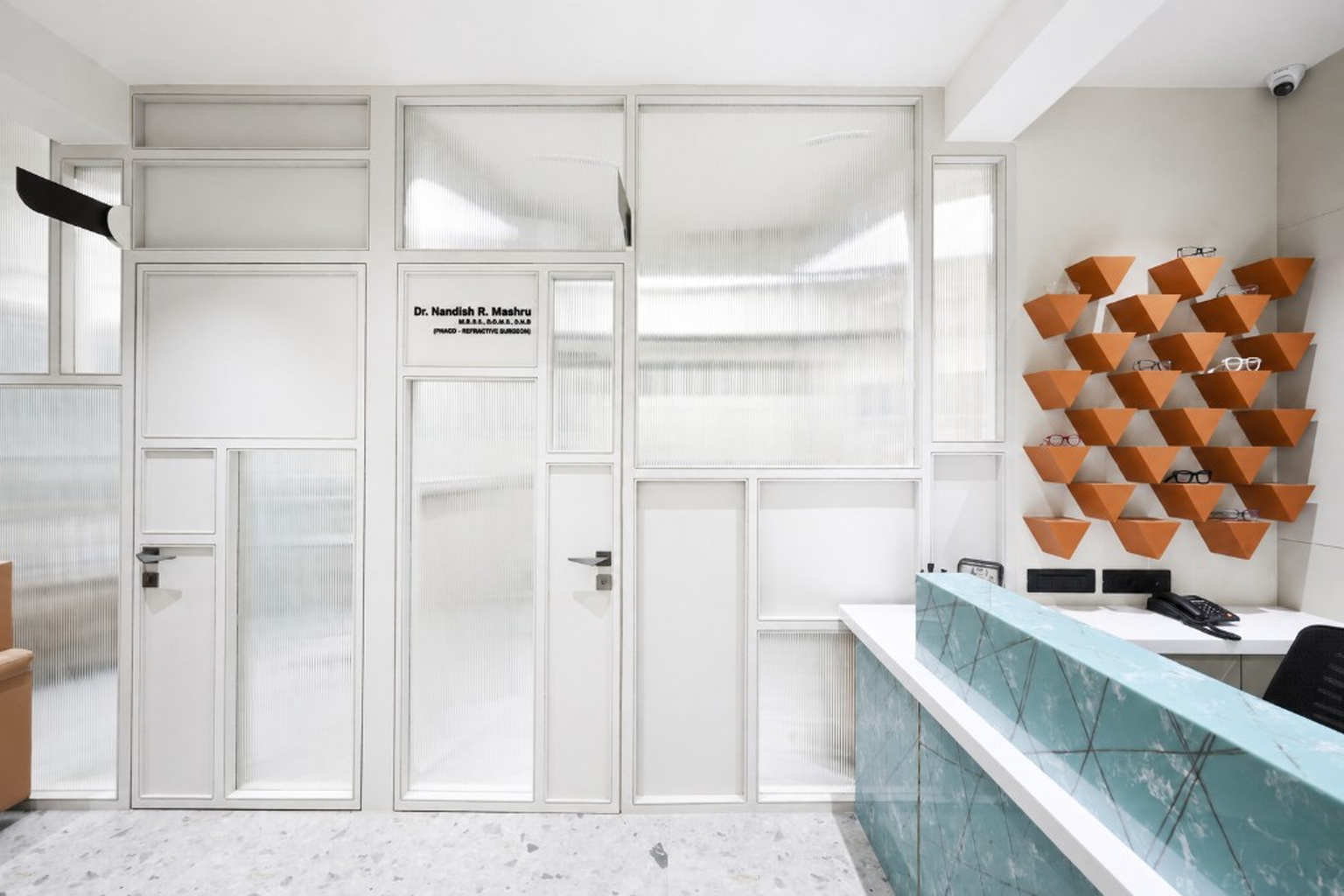 Consultation rooms and eyewear display inside the clinic