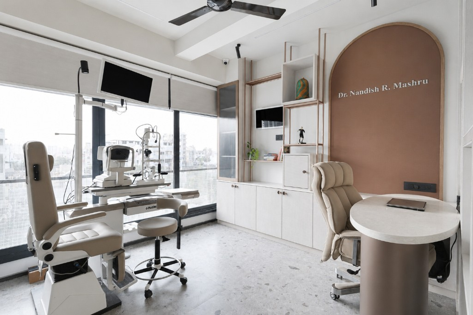 Modern eye examination room with diagnostic equipment