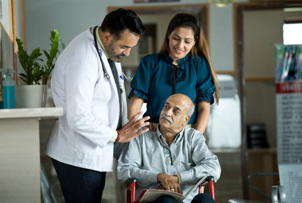 Doctor explaining a care plan to a patient and family member